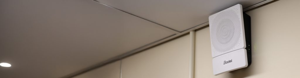 a white ceiling with a white door