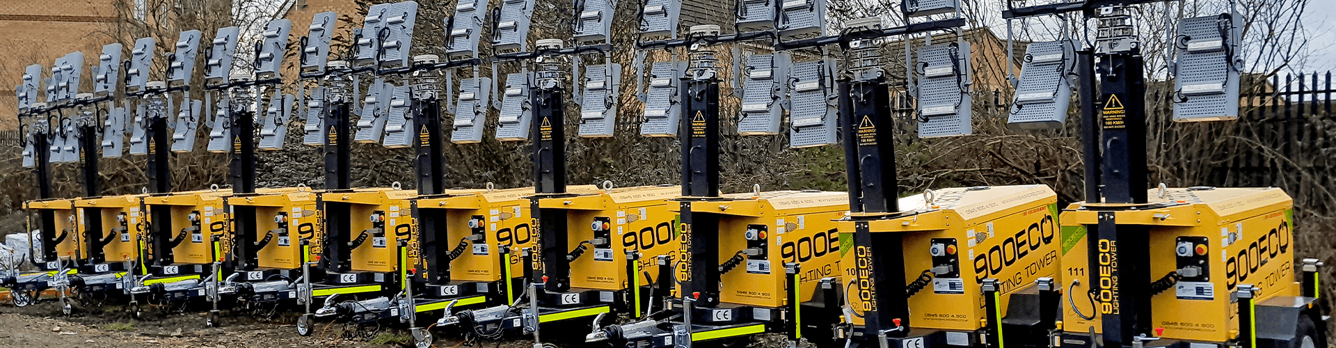 Row of yellow lighting towers