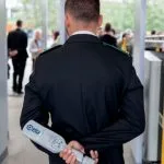 handheld metal detector in hand