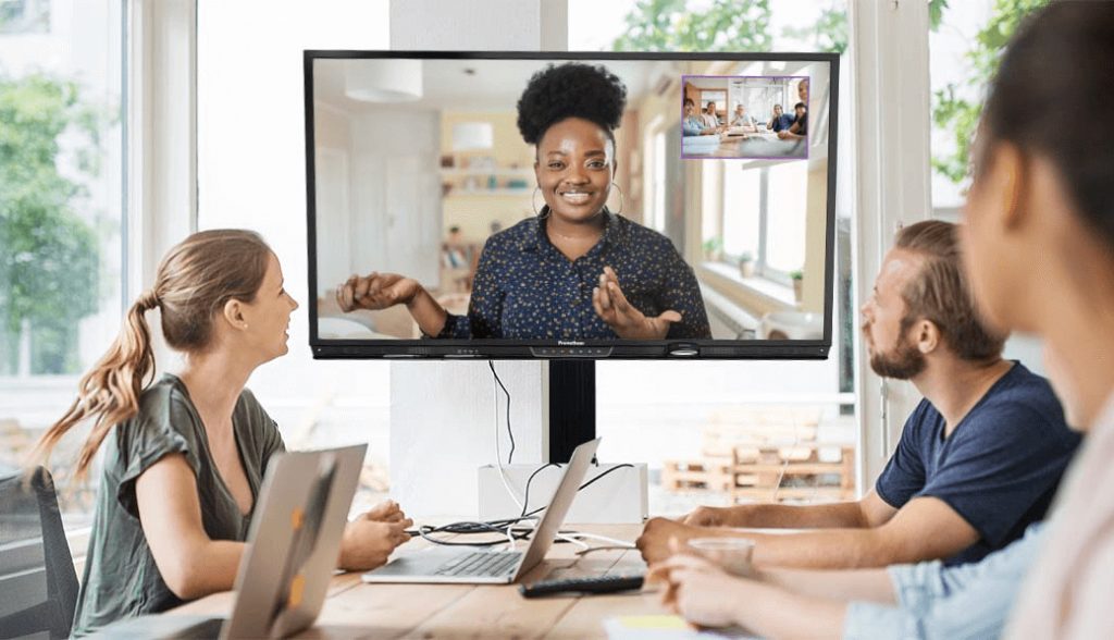 meeting with a group of people looking at the screen with a webcam