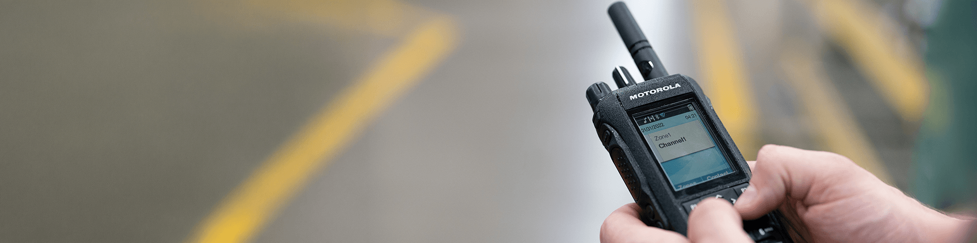 Handheld radio displaying communication message